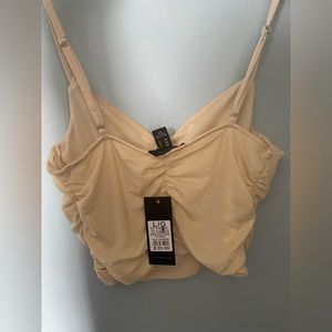 Forever 21 beige tank top. Never worn.